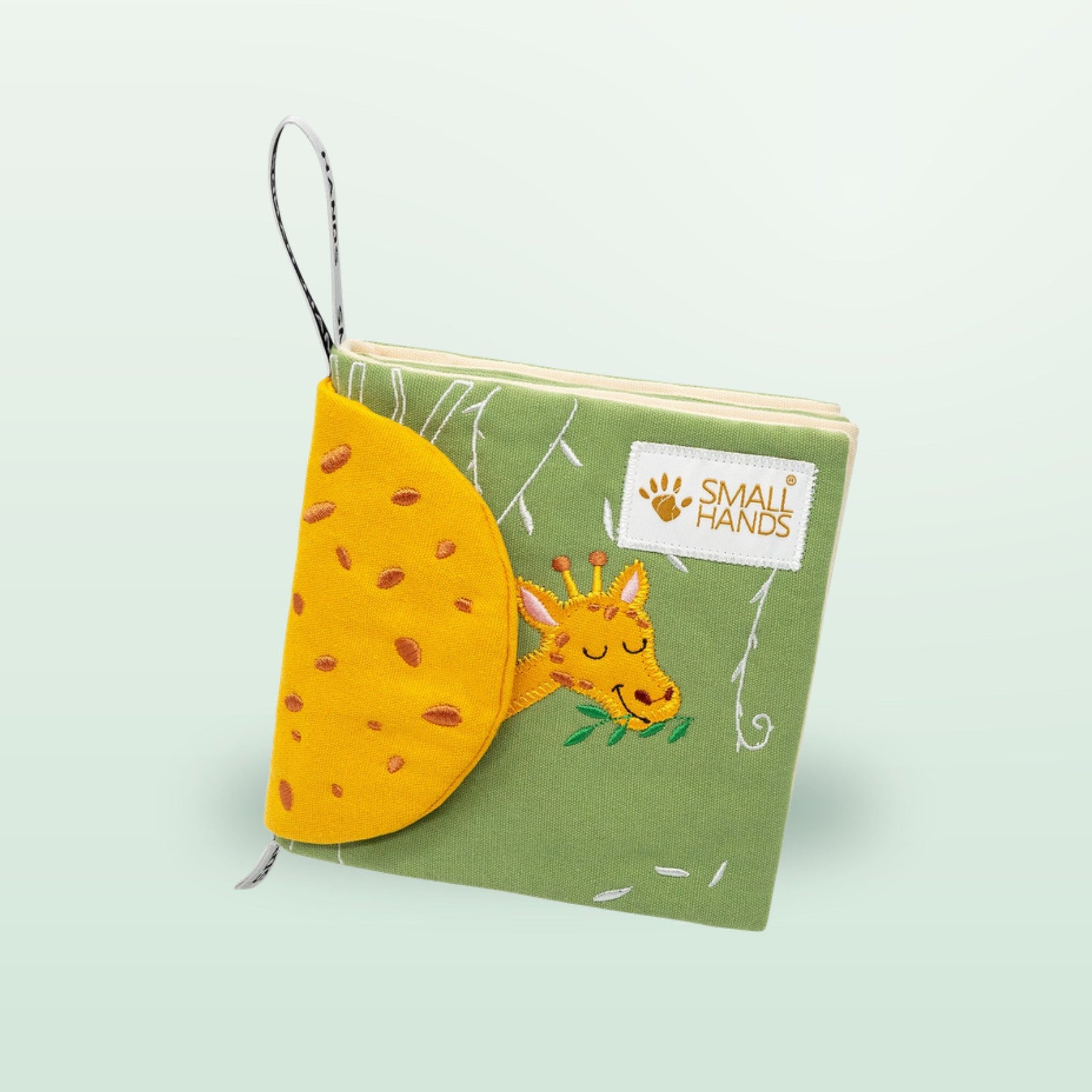 Small Hands Tiere Afrikas Montessori Stoffbuch stehend mit Giraffe auf sanftem Waldgrün-Hintergrund – ab 0 Monaten