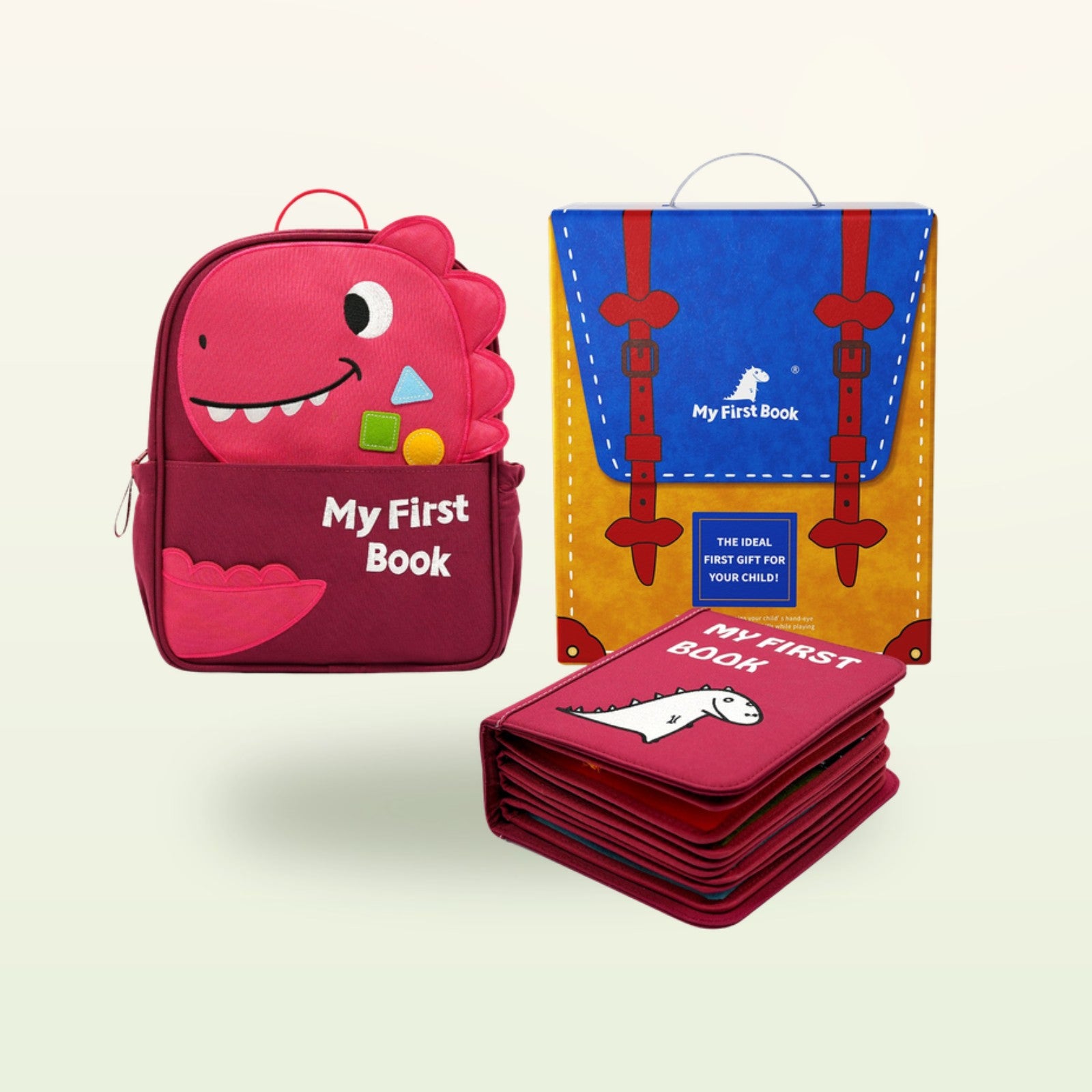 Mein Alltag rot Montessori Quiet Book mit passendem rotem Dino-Rucksack und Geschenkbox auf sanftem cremefarbenem Hintergrund – komplettes Set ab 1 Jahr