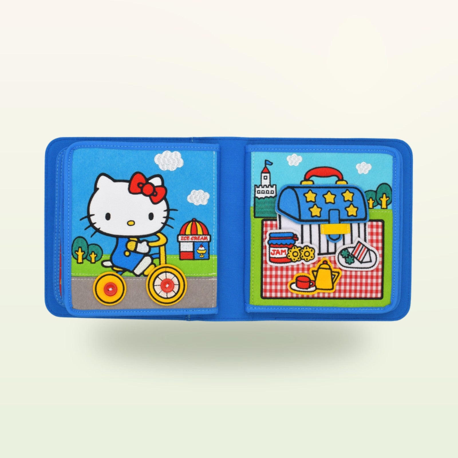 Hello Kitty Quiet Book Roller-Doppelseite auf sanftem Creme-Hintergrund – ab 1 Jahr