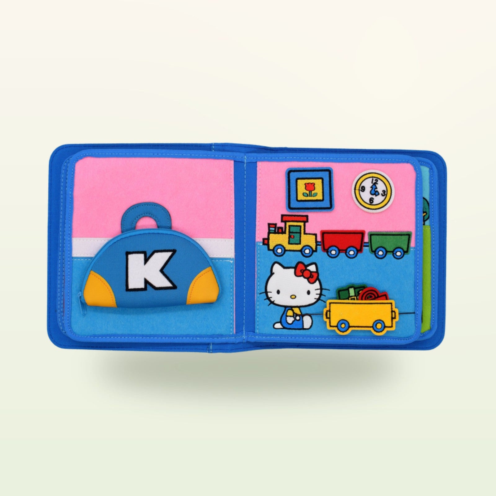 Hello Kitty Quiet Book Einkauf-Doppelseite auf sanftem Creme-Hintergrund – ab 1 Jahr