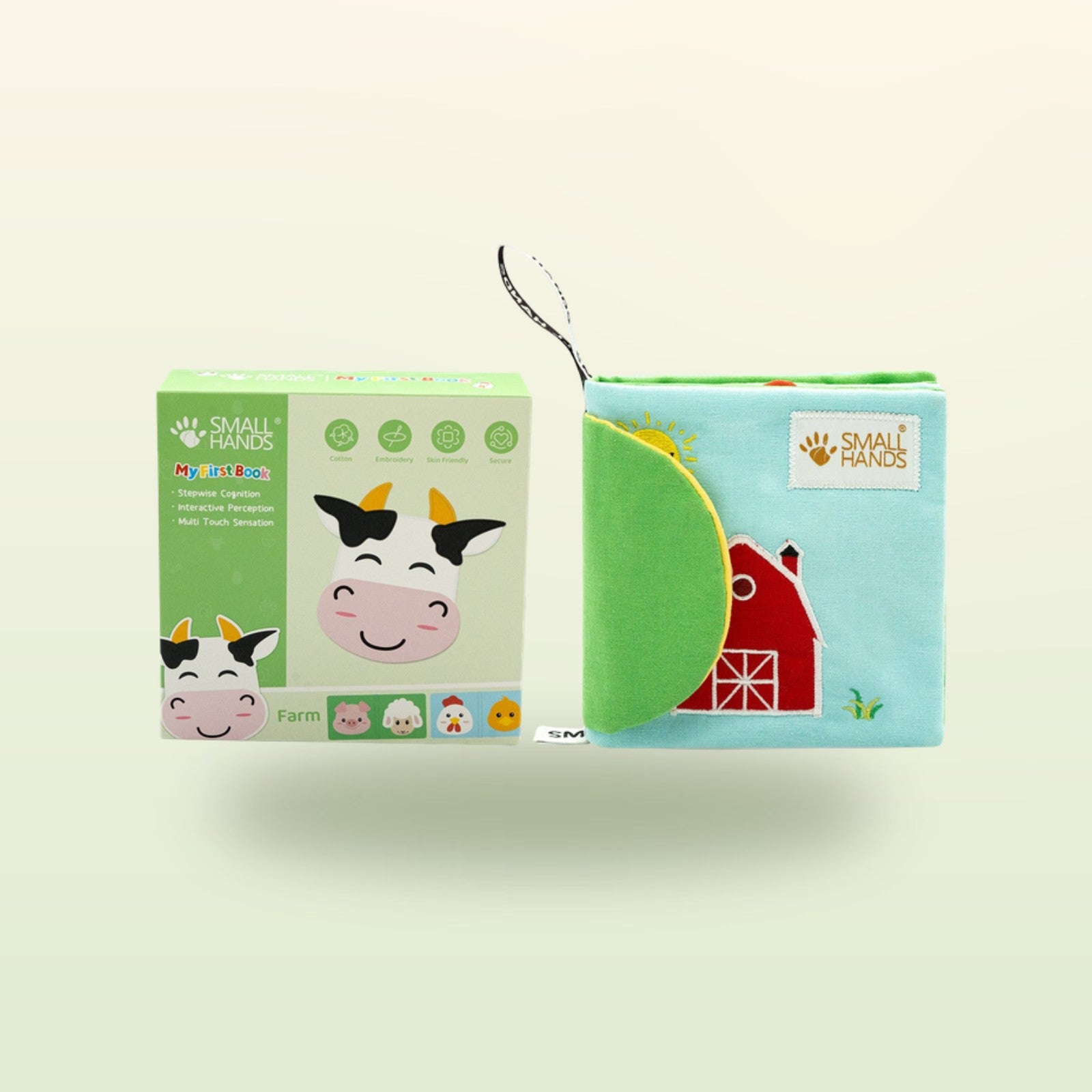 My First Book Small Hands Bauernhof Stoffbuch Set mit Verpackung auf sanftem Wiesengrün-Hintergrund – ab 0 Monaten