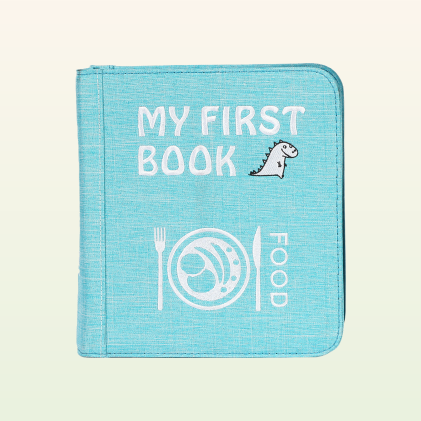 Kleine Feinschmecker Quiet Book geschlossen – hellblaues MY-FIRST-BOOK-Food-Cover auf sanftem Creme-Hintergrund